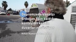 Depremzede sanatçı, konteyner kentin duvarlarını resimlerle süslüyor