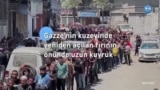 Gazze’nin kuzeyinde yeniden açılan fırının önünde uzun kuyruk